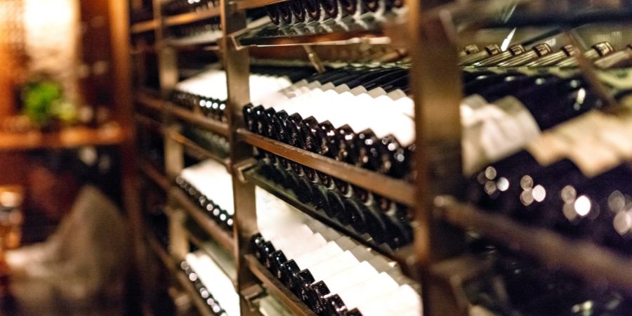 Protea Financial Lease Accounting rows of wine bottles on racks
